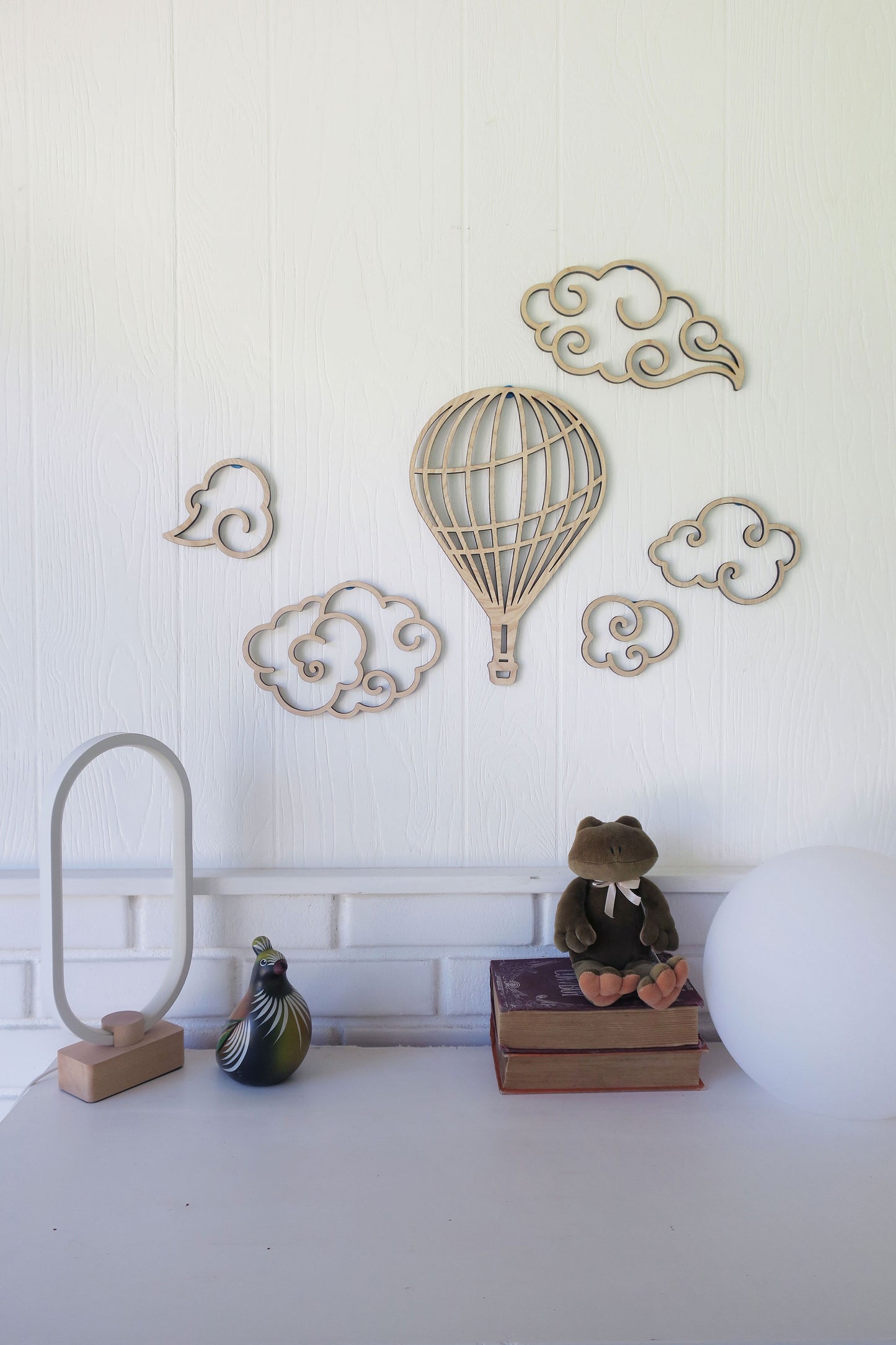 Wood balloon with clouds wall decor